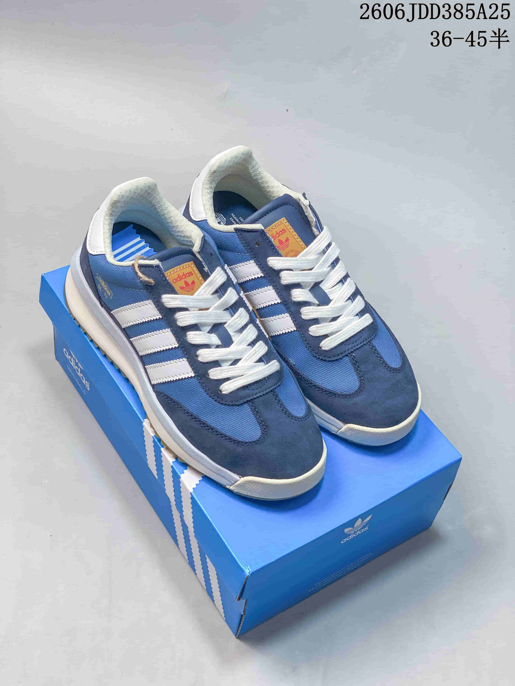 Blue and white adidas SL 72 sneakers shown on a blue shoebox; image overlay states sizes 36–45.
