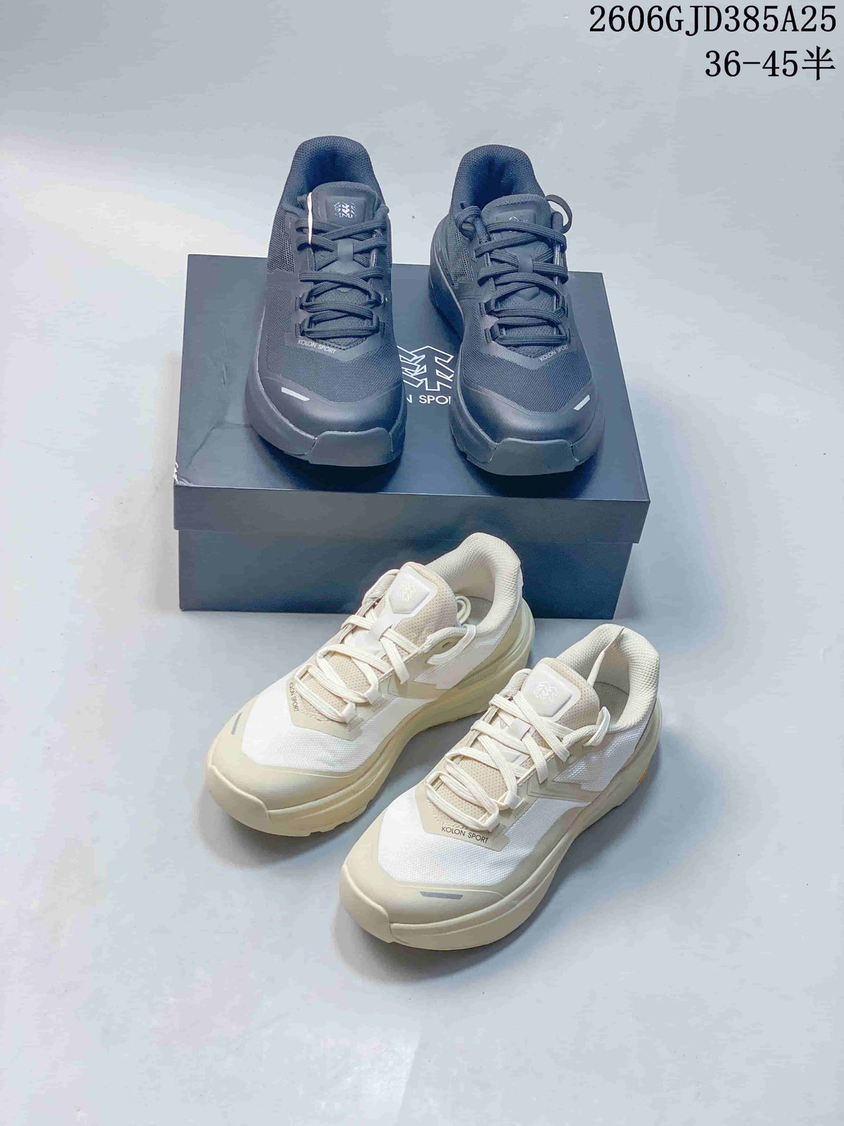 Dark gray and off-white Kolon Sport shoes shown from above