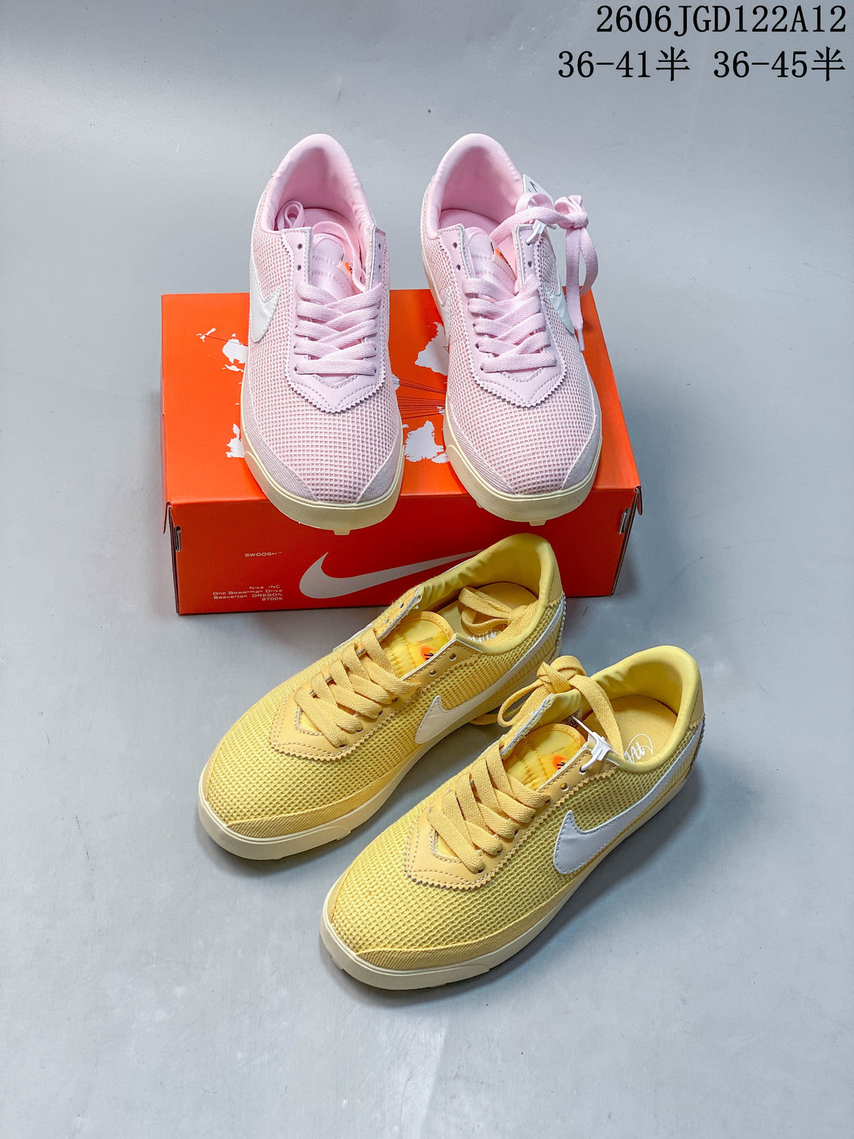Pink and yellow Nike Astro Grabber sneakers pictured together