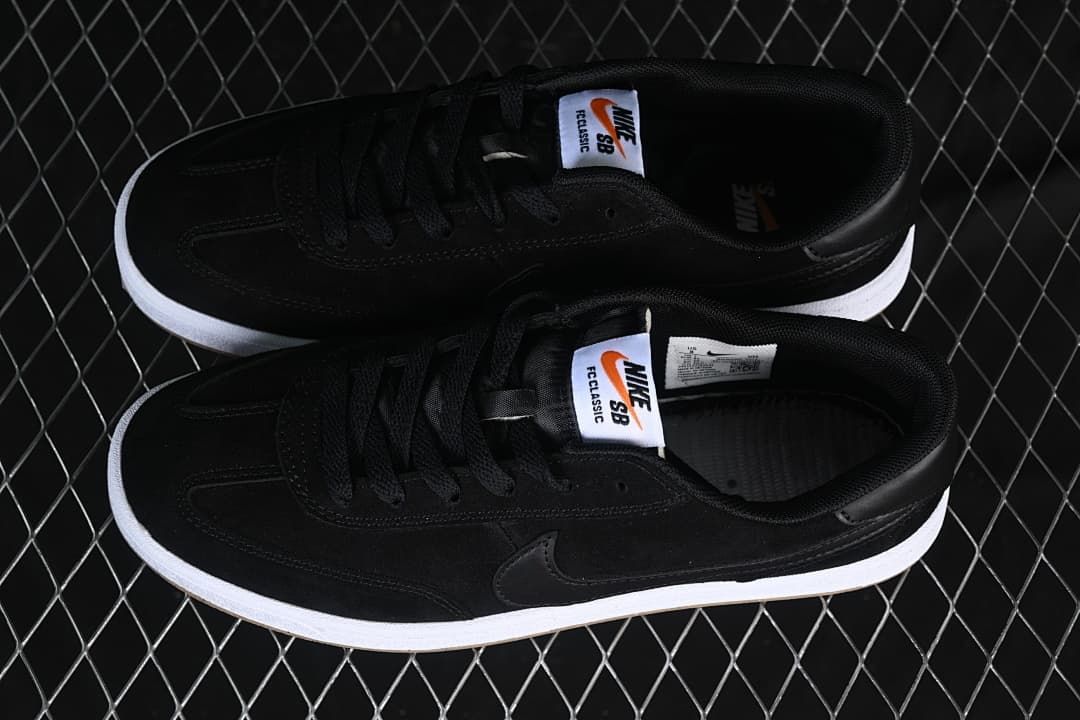 Pair of black Nike SB FC Classic shoes shown from above.