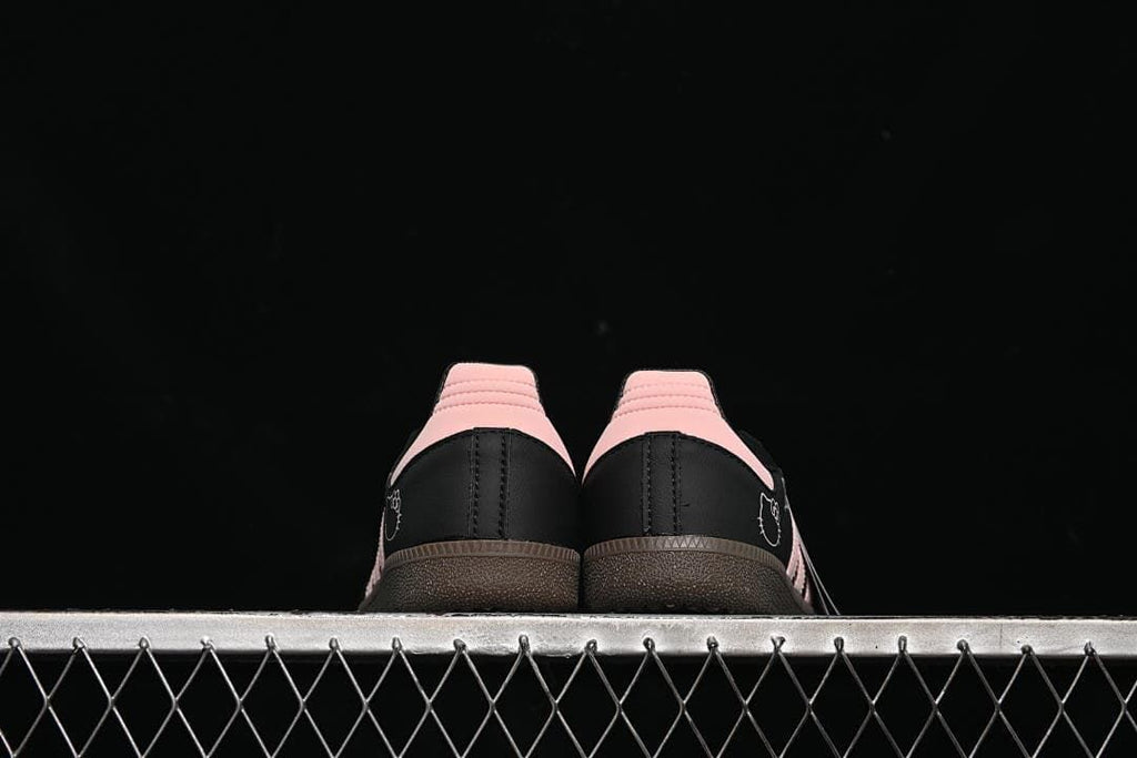 Rear view of the pair with pink heel panels