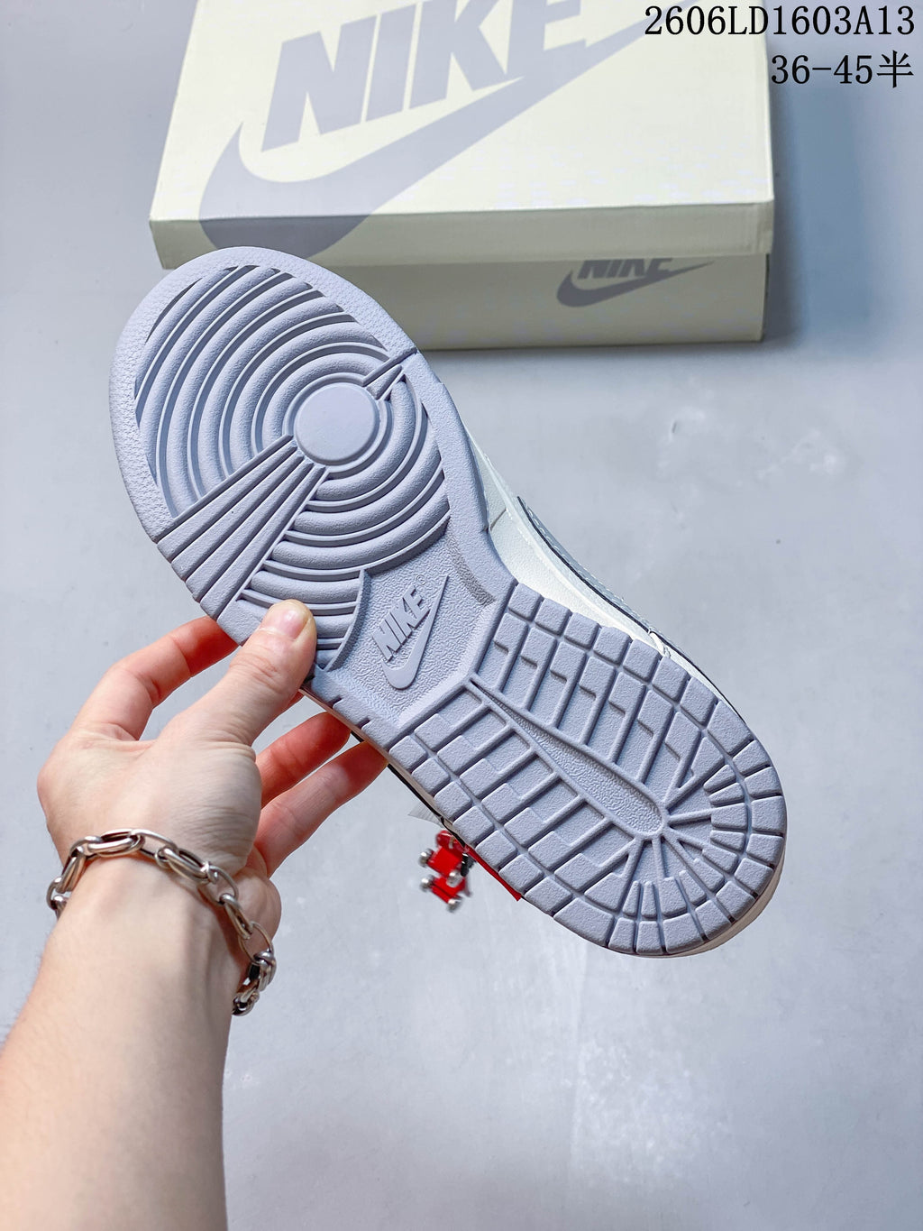 Grey outsole of the Nike Dunk Low-style sneaker
