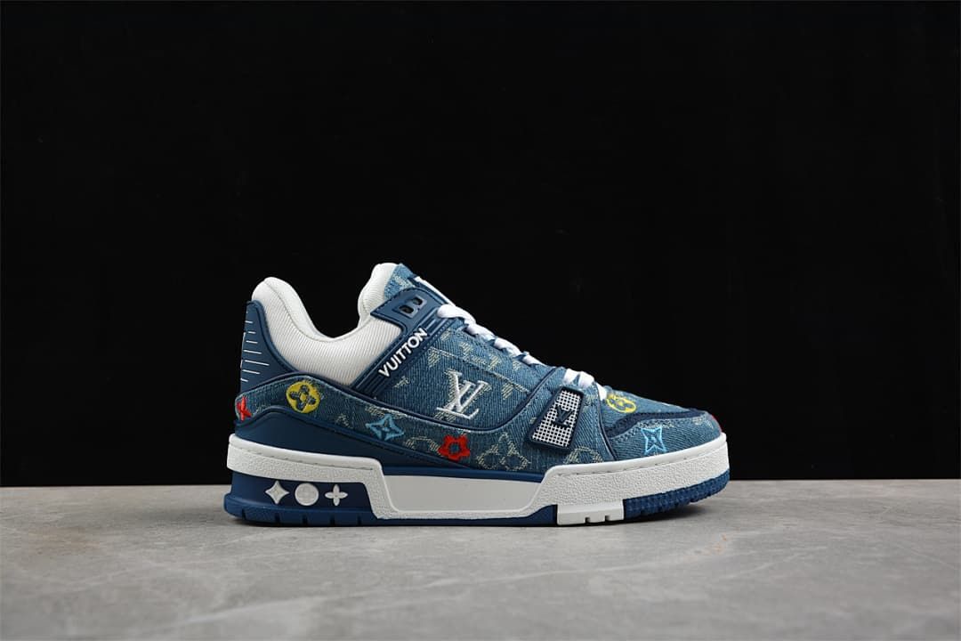Opposite side profile of the blue patterned sneaker with white midsole.