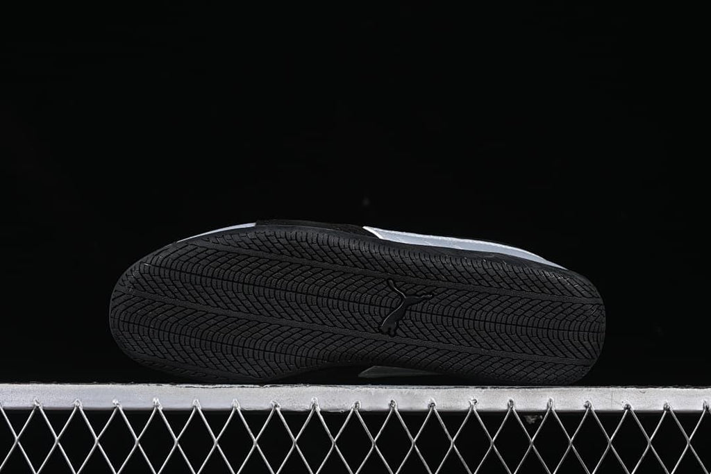 Underside view showing the black patterned outsole.