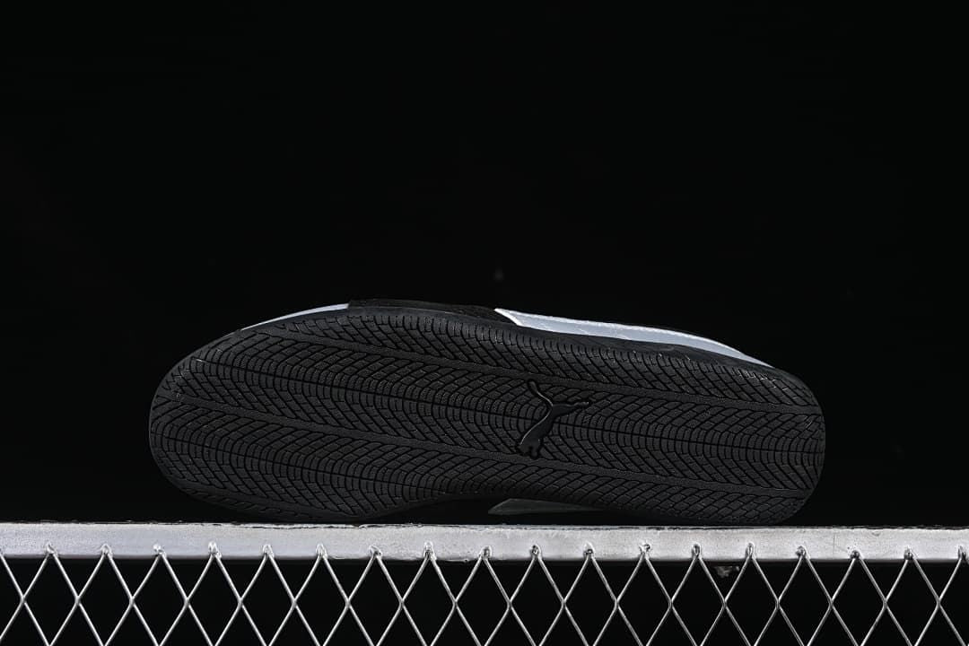 Underside view showing the black patterned outsole.