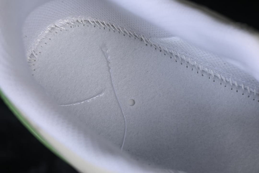 Close-up of the shoe's interior stitching and lining