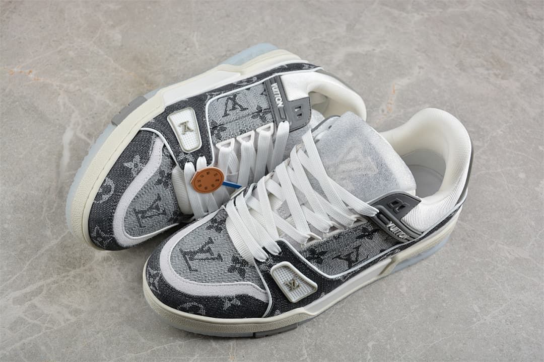 Pair of gray patterned Trainer-style sneakers viewed from above.