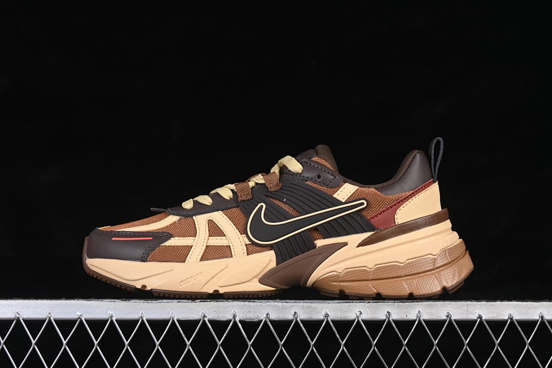 Opposite side view of brown and beige Nike V2K Run sneakers