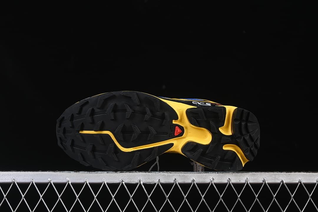 Underside view showing the lugged outsole
