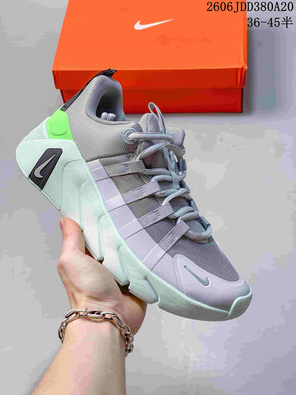 Light gray shoe with mint and bright green accents