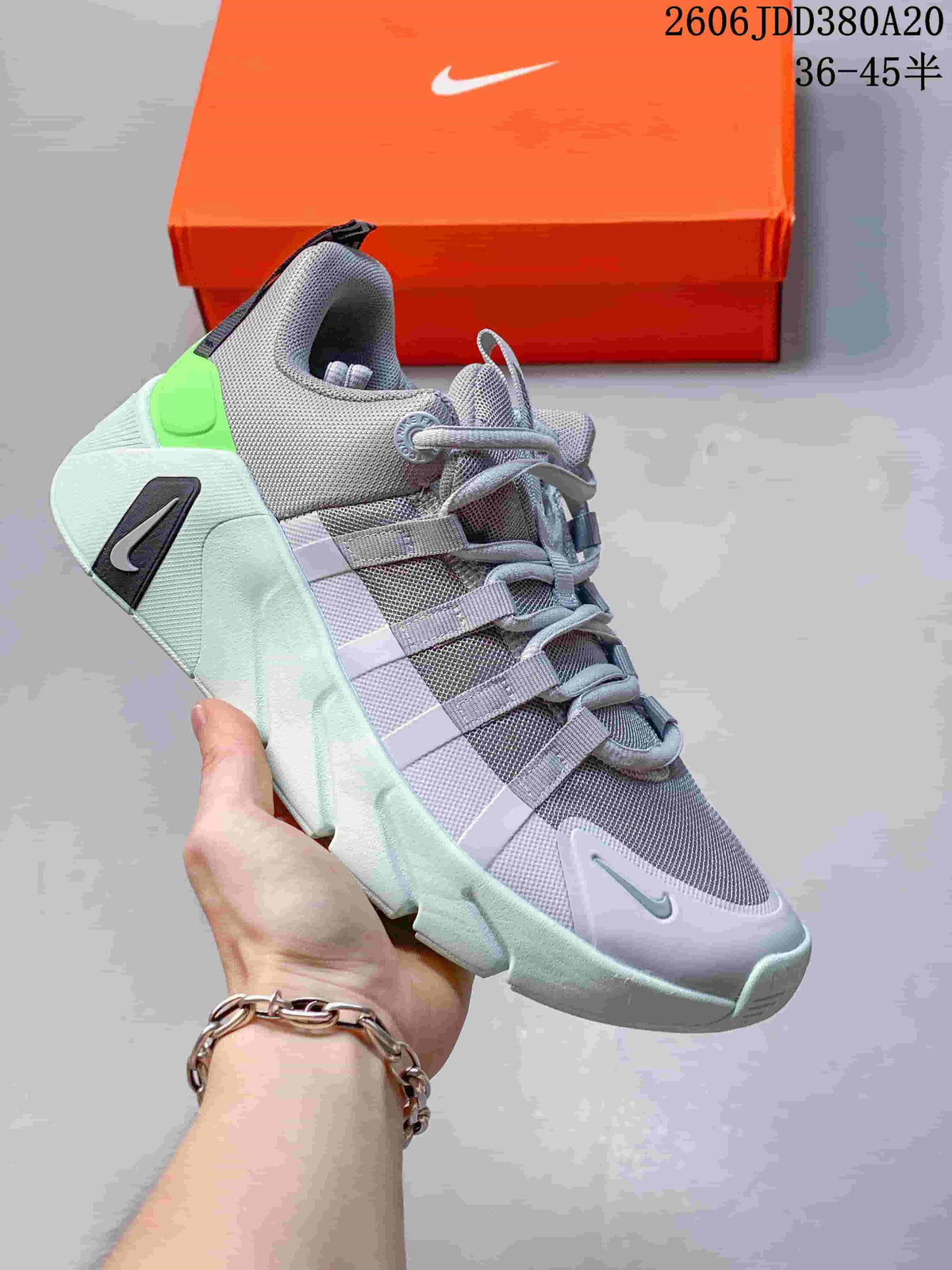 Light gray shoe with mint and bright green accents