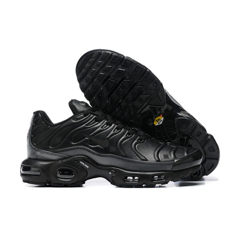 Black Nike Air Max Plus-style sneakers shown from the side and underneath.