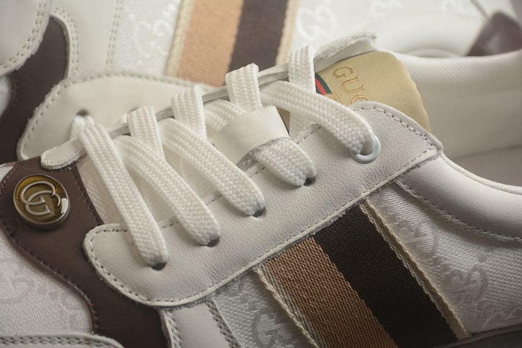 Close-up of the laces, striped side panel, and decorative logo detail