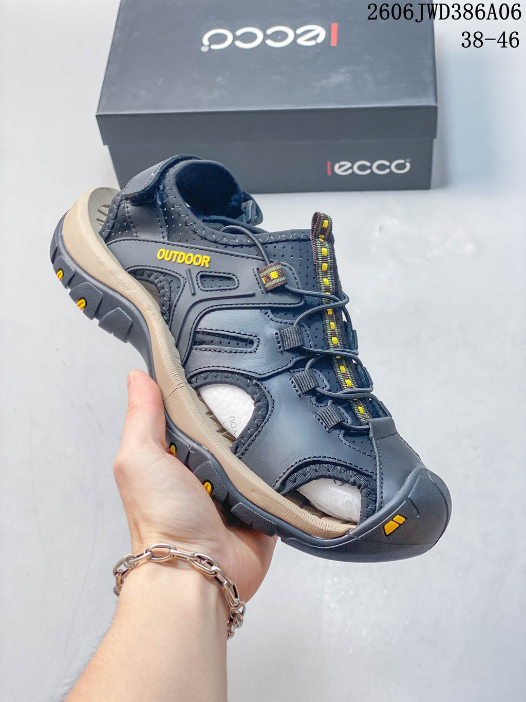 Side view of a dark gray ECCO closed-toe sandal with adjustable fastening and a rugged-looking outsole.