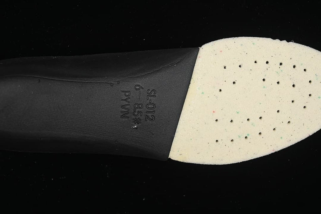Close-up of the shoe's removable insole underside.