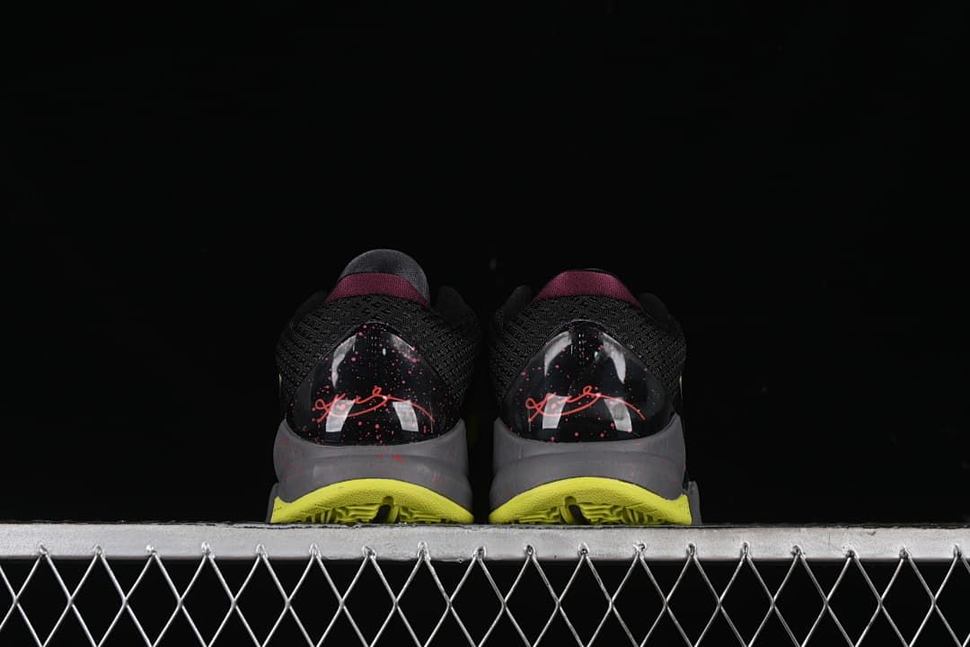 Rear view of both shoes showing heel signatures