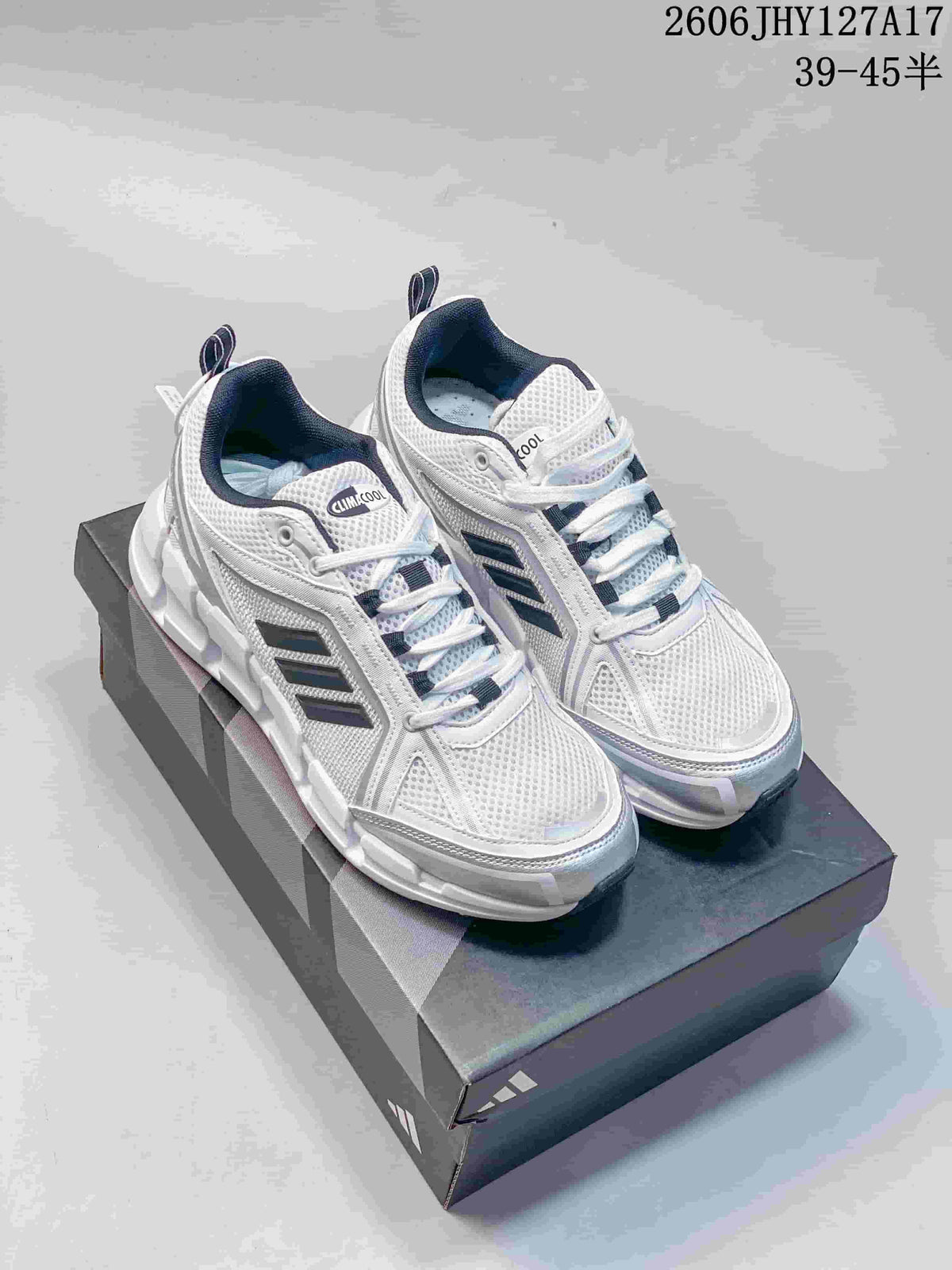 Pair of white and silver Adidas Climacool Ventage sneakers shown from above