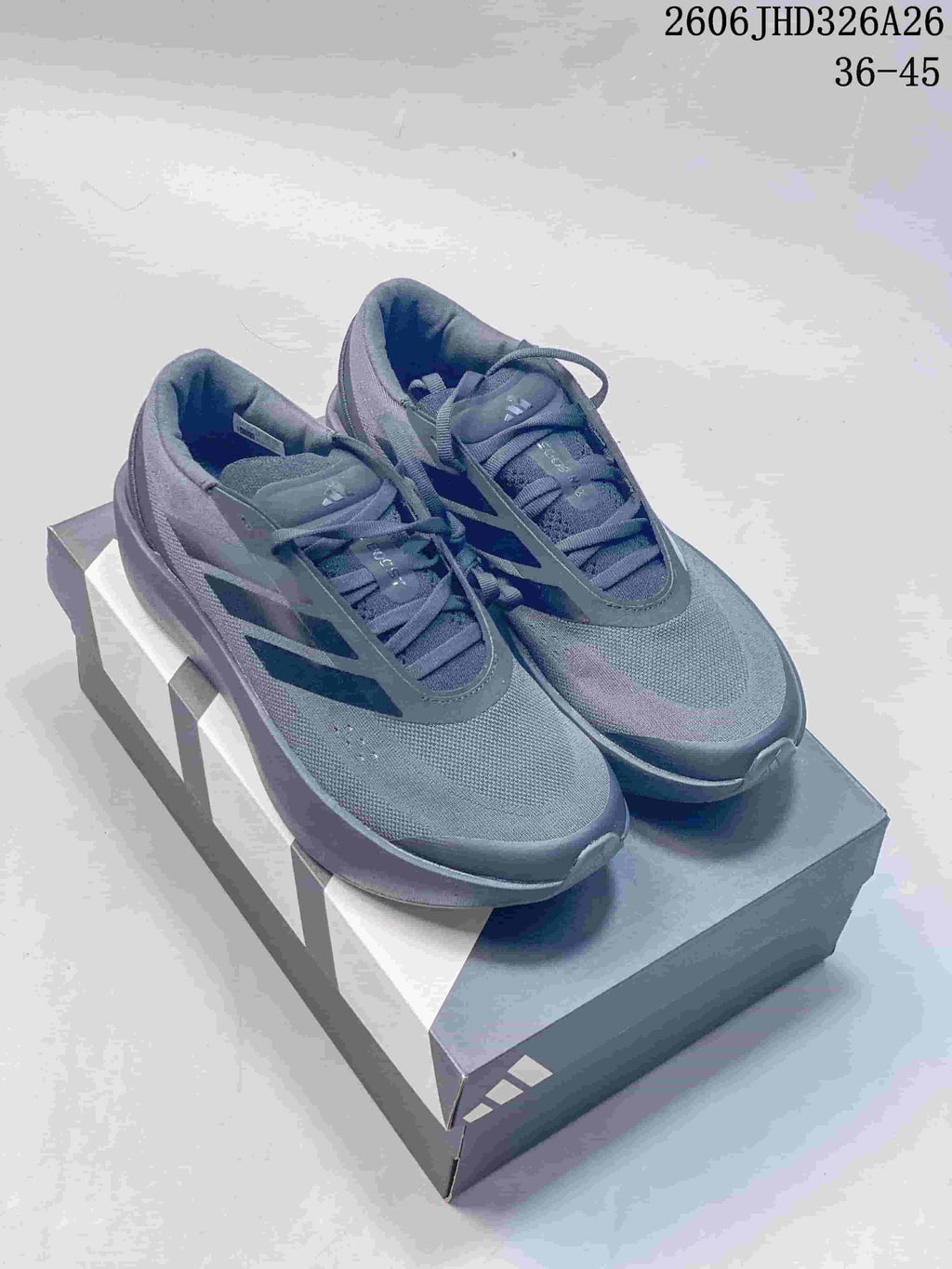 Pair of dark gray adidas Supernova Rise 3 running shoes
