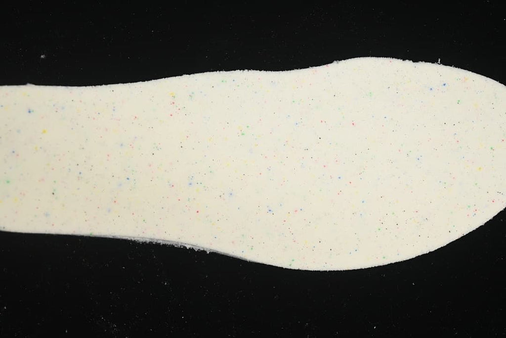 Close-up of the speckled underside of the shoe insole
