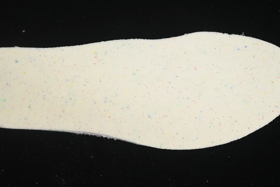 Close-up of the speckled underside of the shoe insole