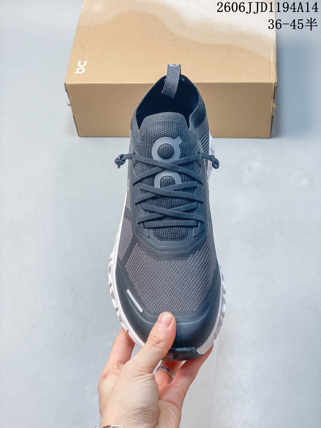 Front view of the Cloud 6 Versa sneaker showing its laces and mesh-like upper