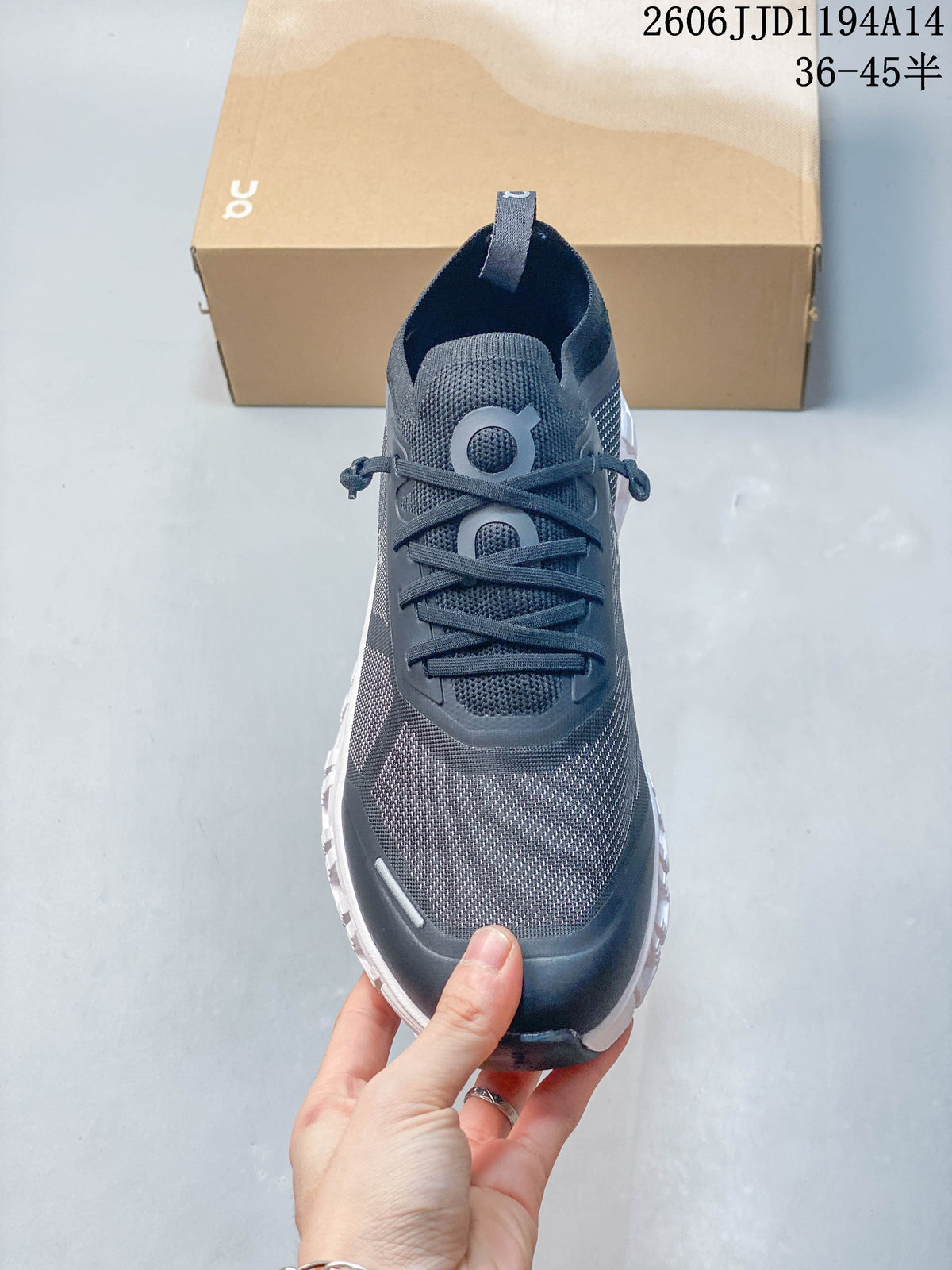 Front view of the Cloud 6 Versa sneaker showing its laces and mesh-like upper