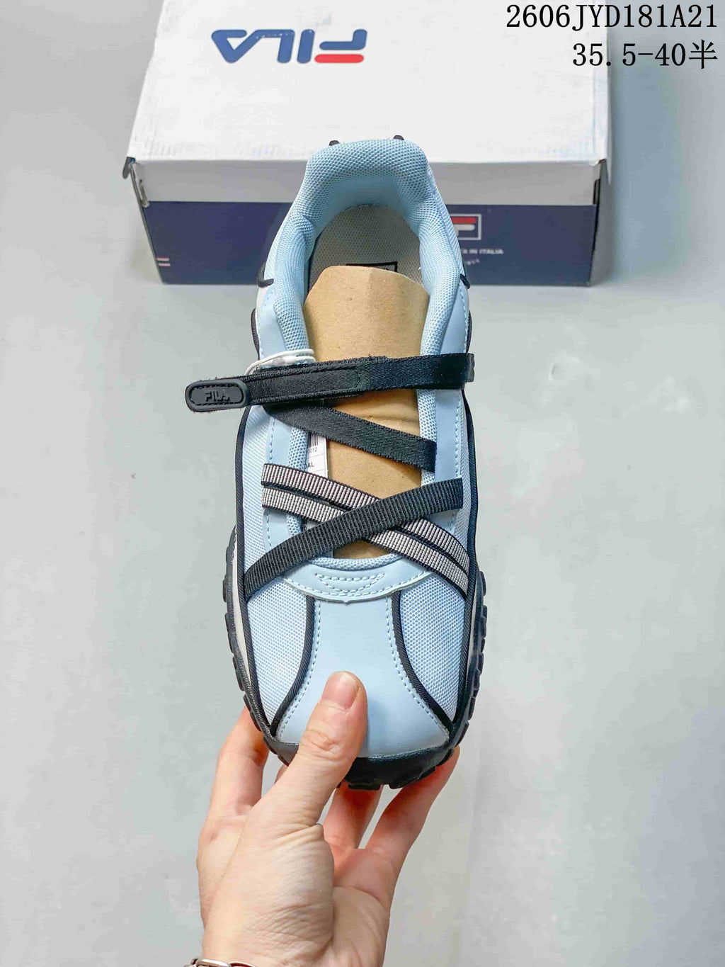 Top view of the sandal showing the toe, crossing straps, and ankle strap.
