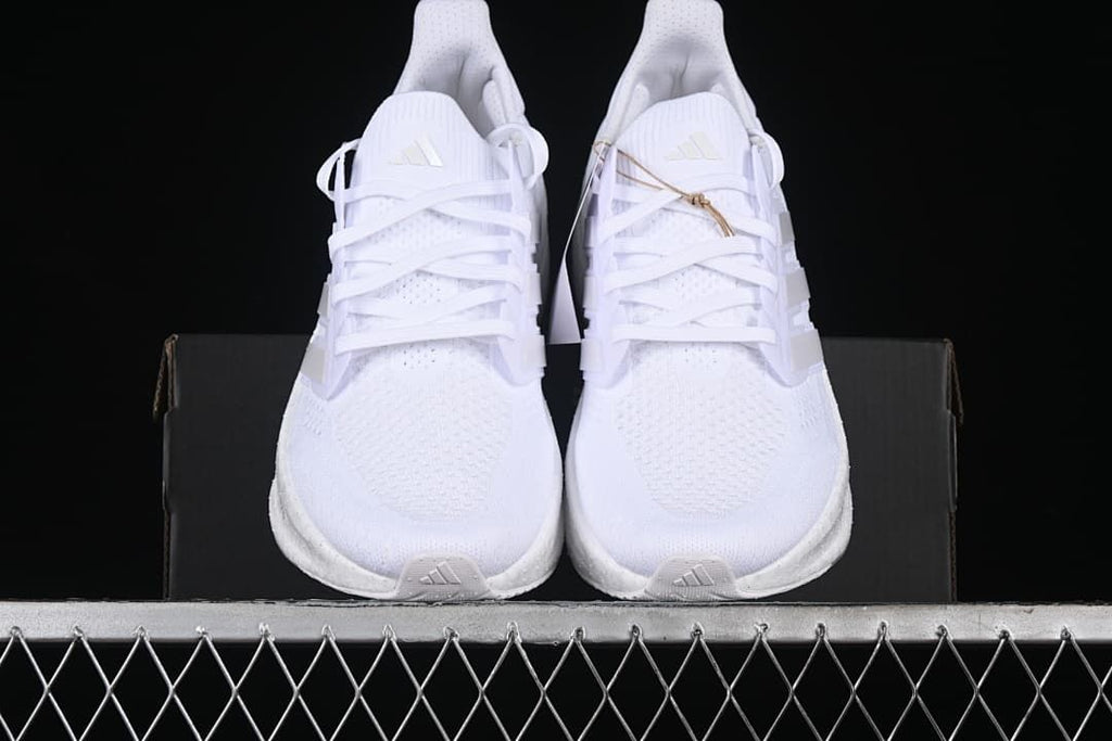 Front view of the pair showing the toes and laces.