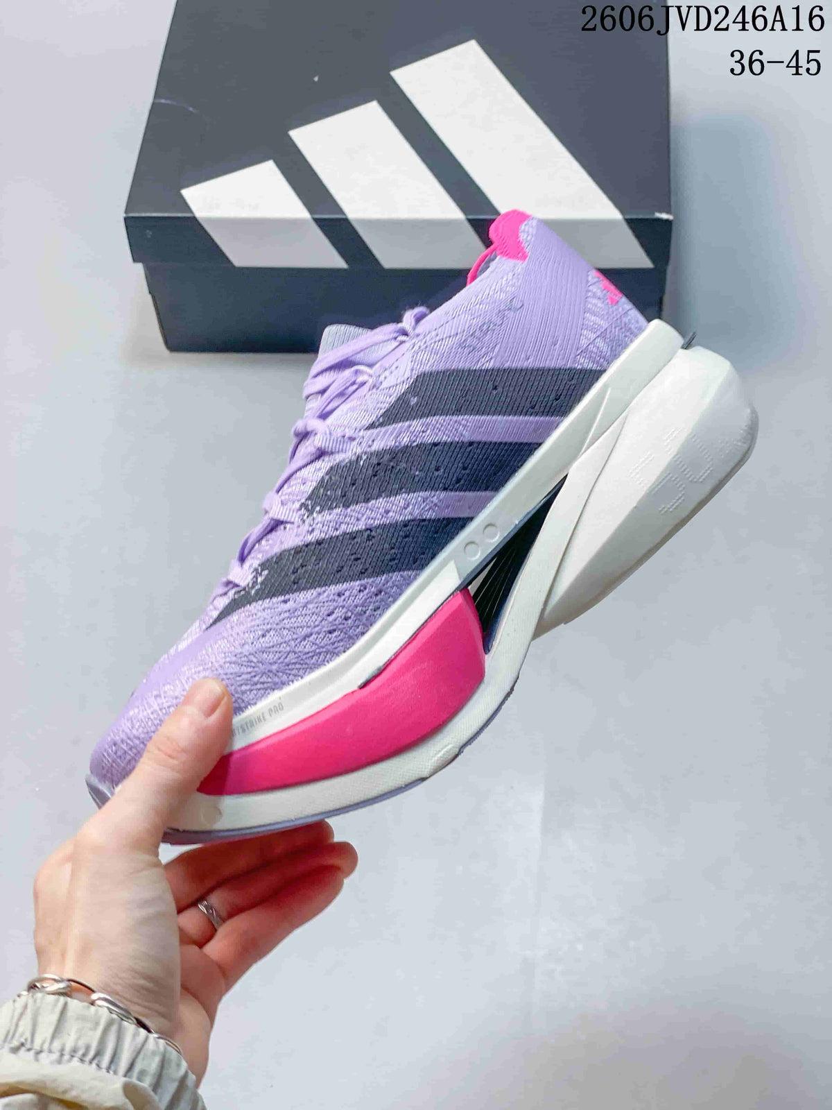 Side view of a lavender running shoe with dark stripes, pink accents, and a sculpted white sole