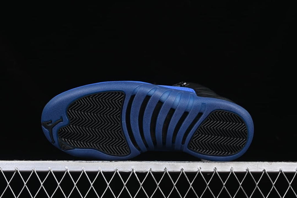 Underside view showing the blue outsole and black traction areas