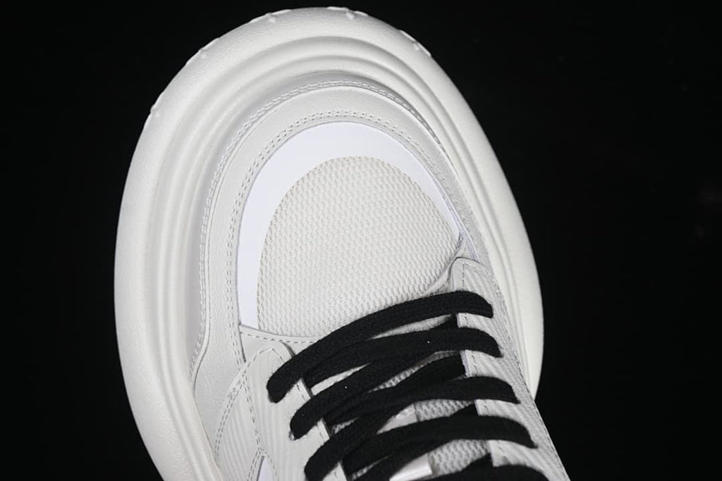 Top view of the toe and black laces