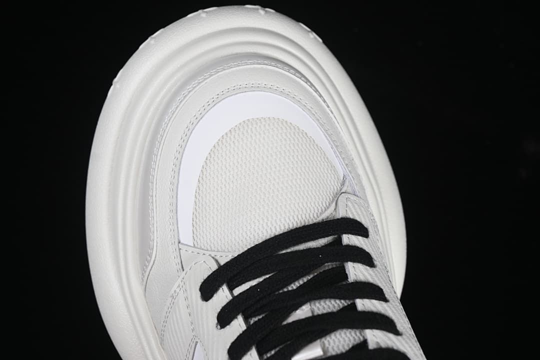 Top view of the toe and black laces
