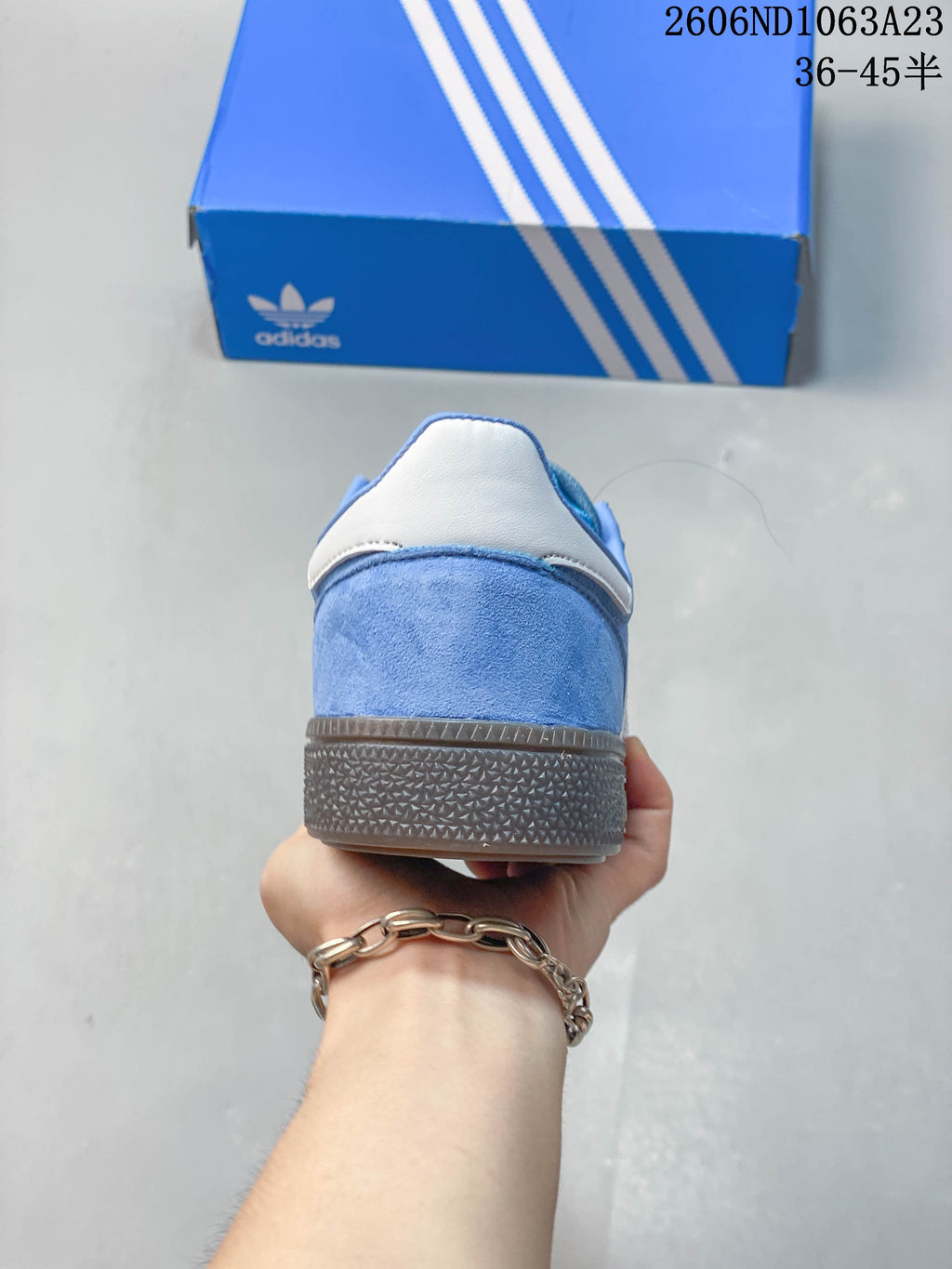 Rear view showing the blue heel and white heel tab