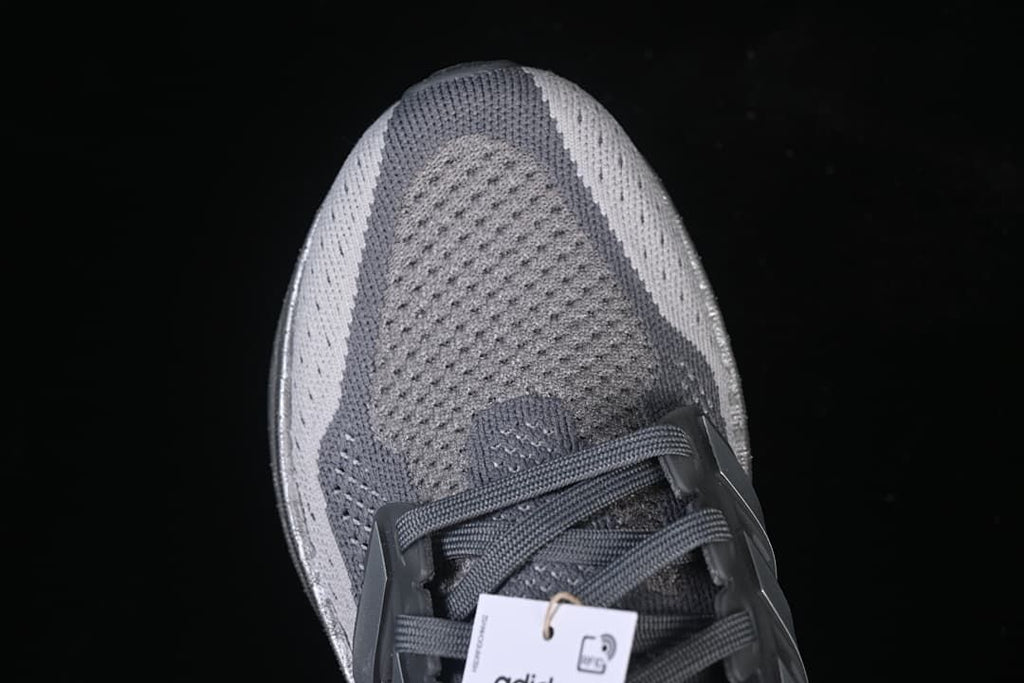 Top view of the grey knit-look toe and lace-up front