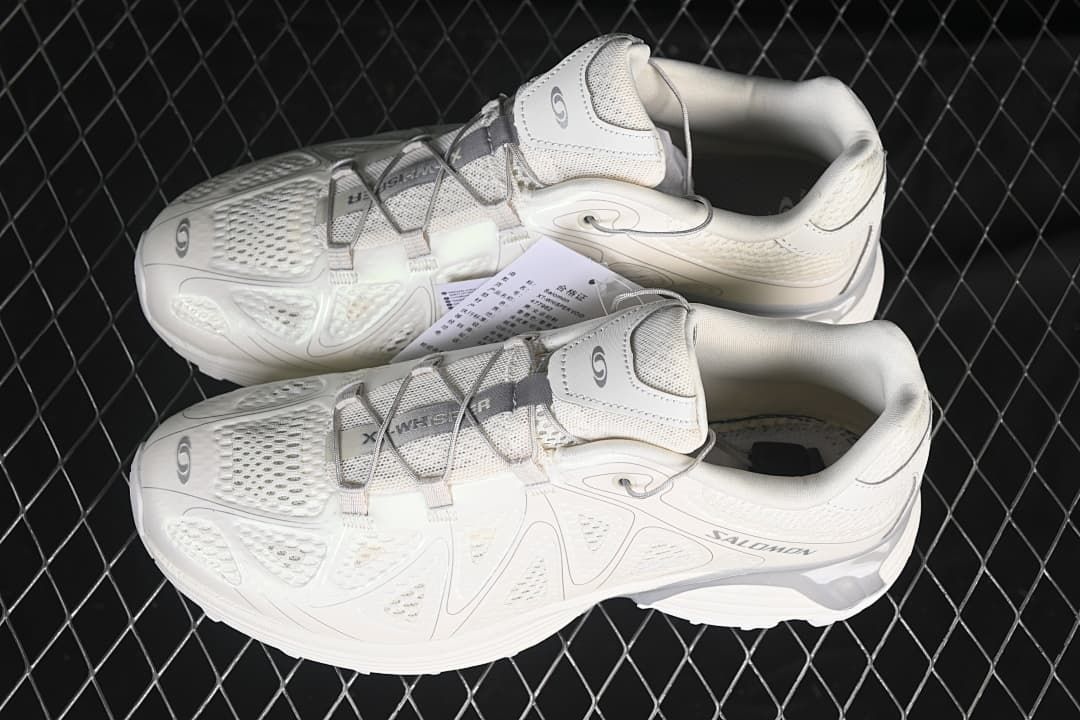 Pair of light-colored XT-Whisper sneakers shown from above