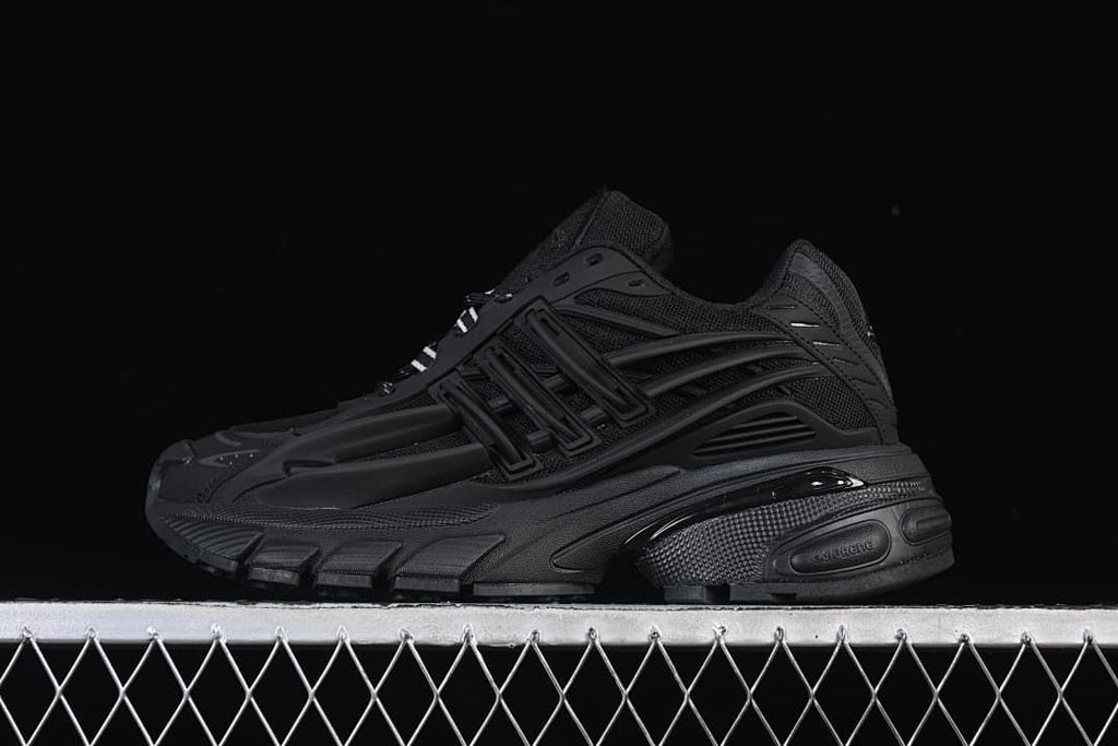 Black Adistar Jellyfish sneaker in side profile.