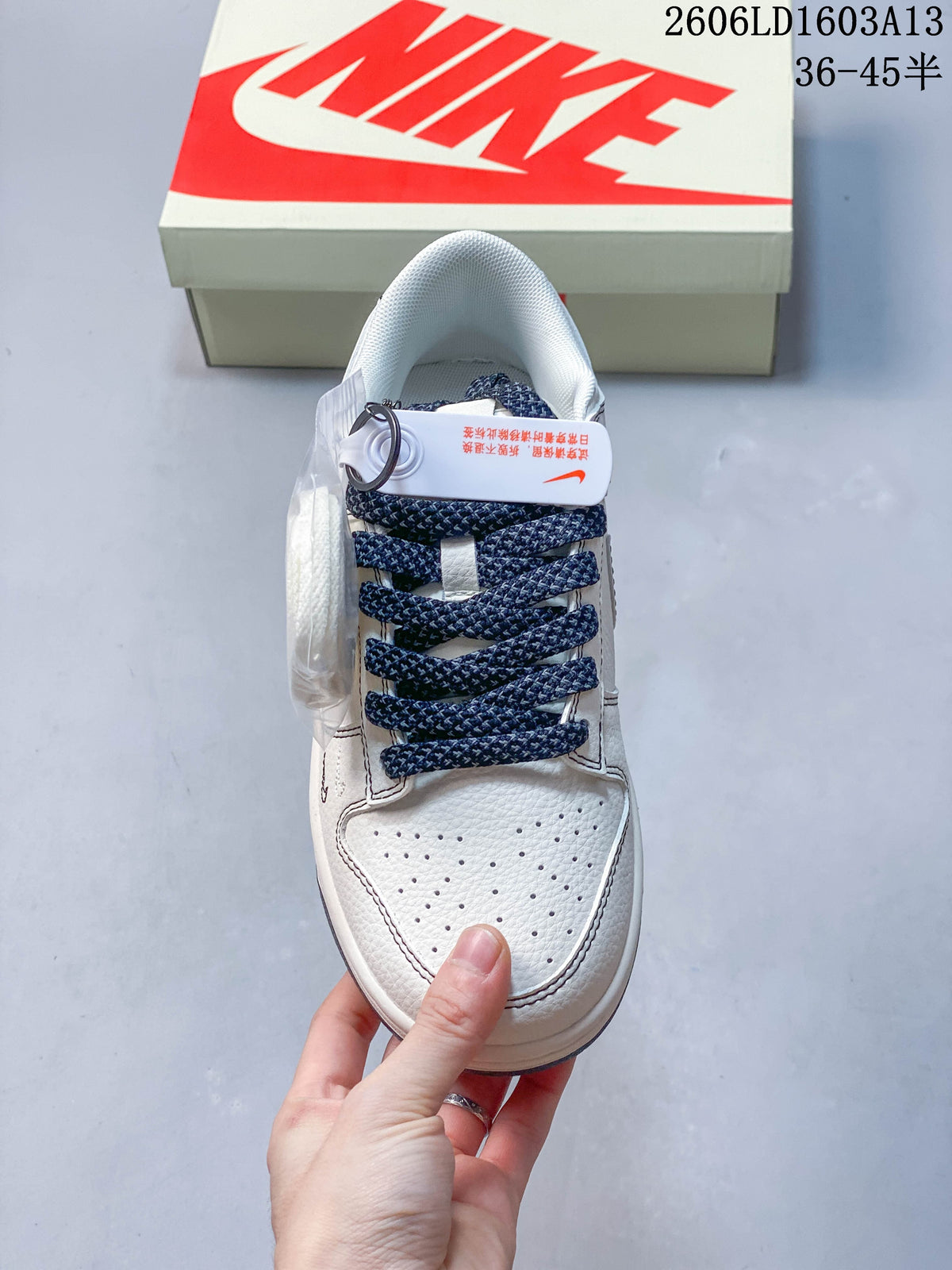 Top view showing the perforated toe and navy laces
