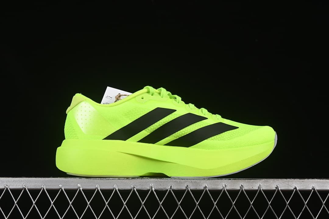 Side profile of the neon yellow Adidas Adizero Evo SL shoe.