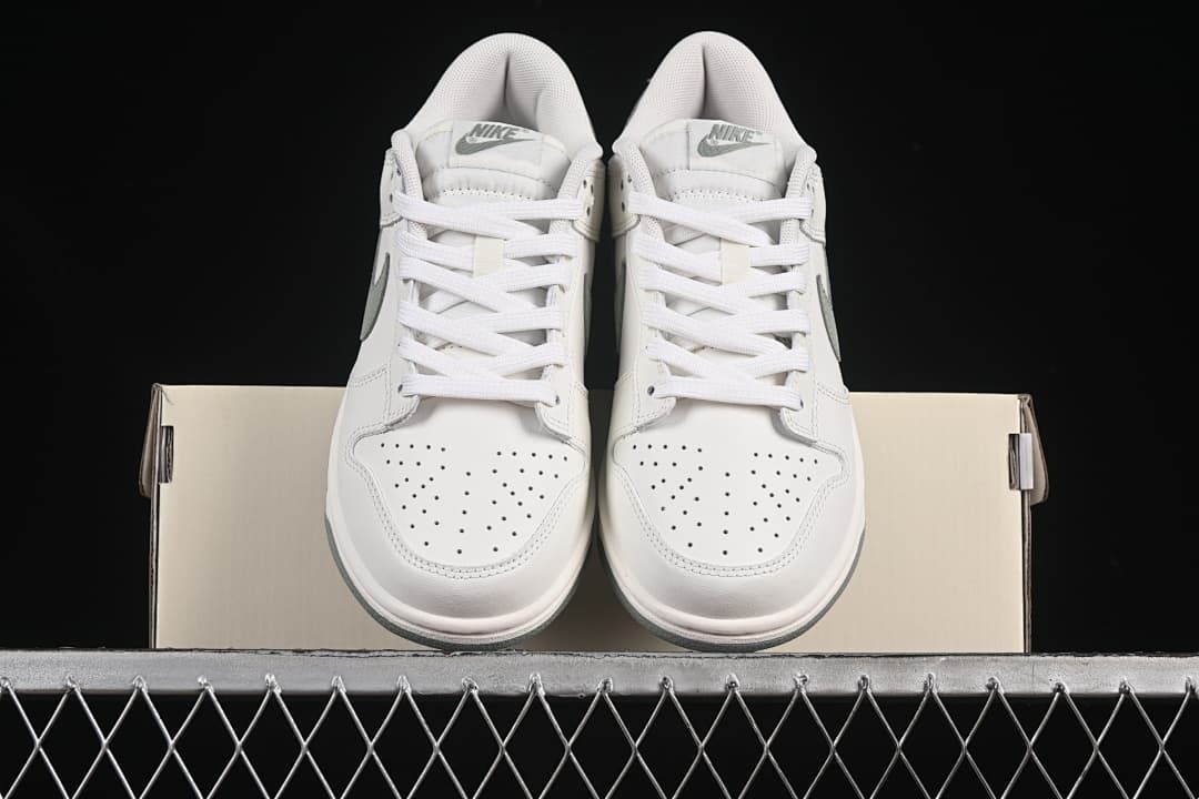 Front view of the pair showing perforated toes and laces