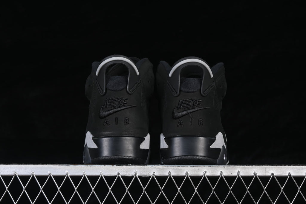 Rear view of the pair with heel pull tabs and embroidered Nike Air branding.