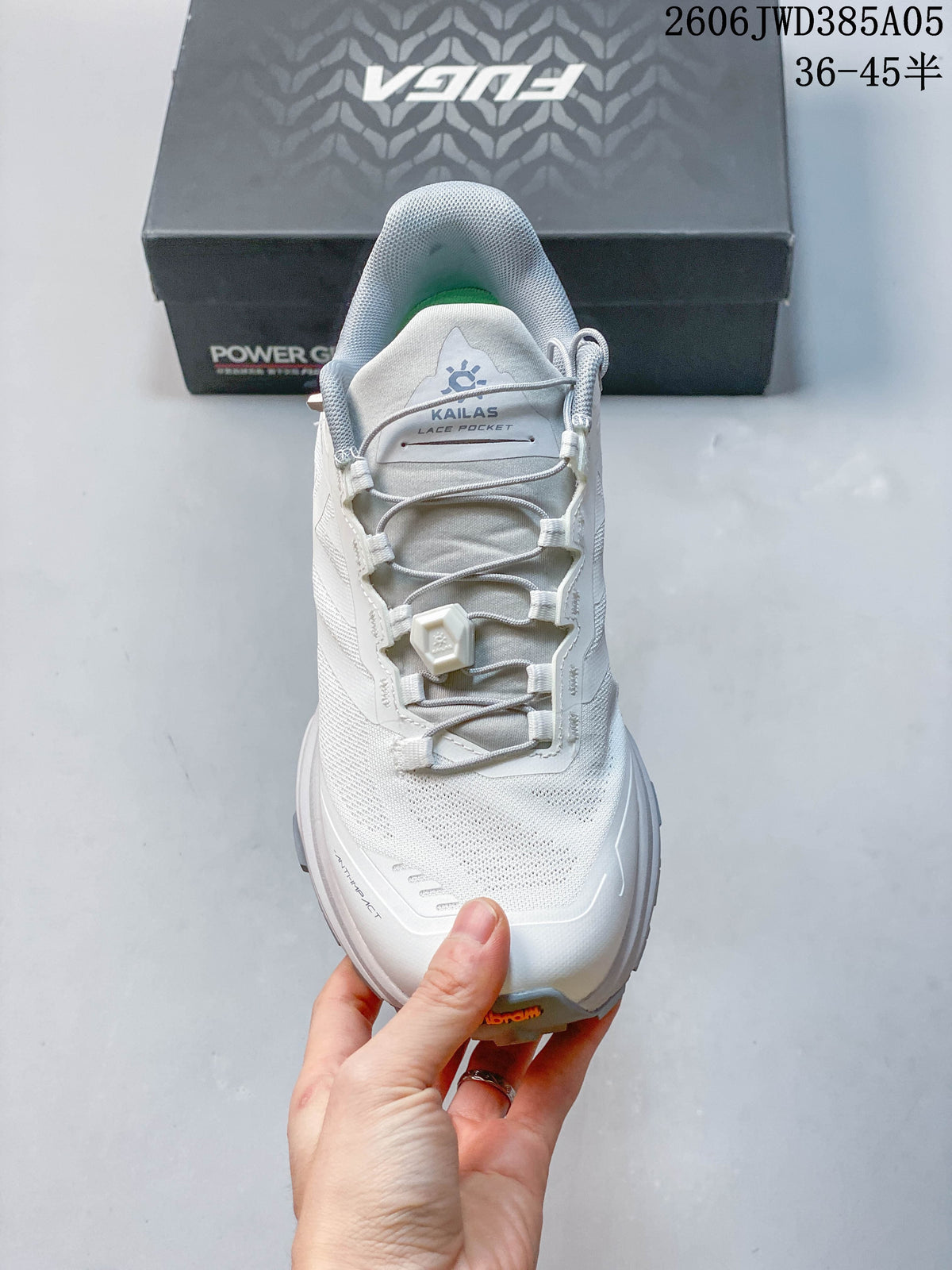 Top view showing the dial-adjustable laces and tongue pocket on the Kailas shoe
