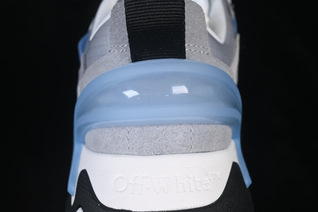 Close-up of the heel with a translucent blue detail and embossed lettering