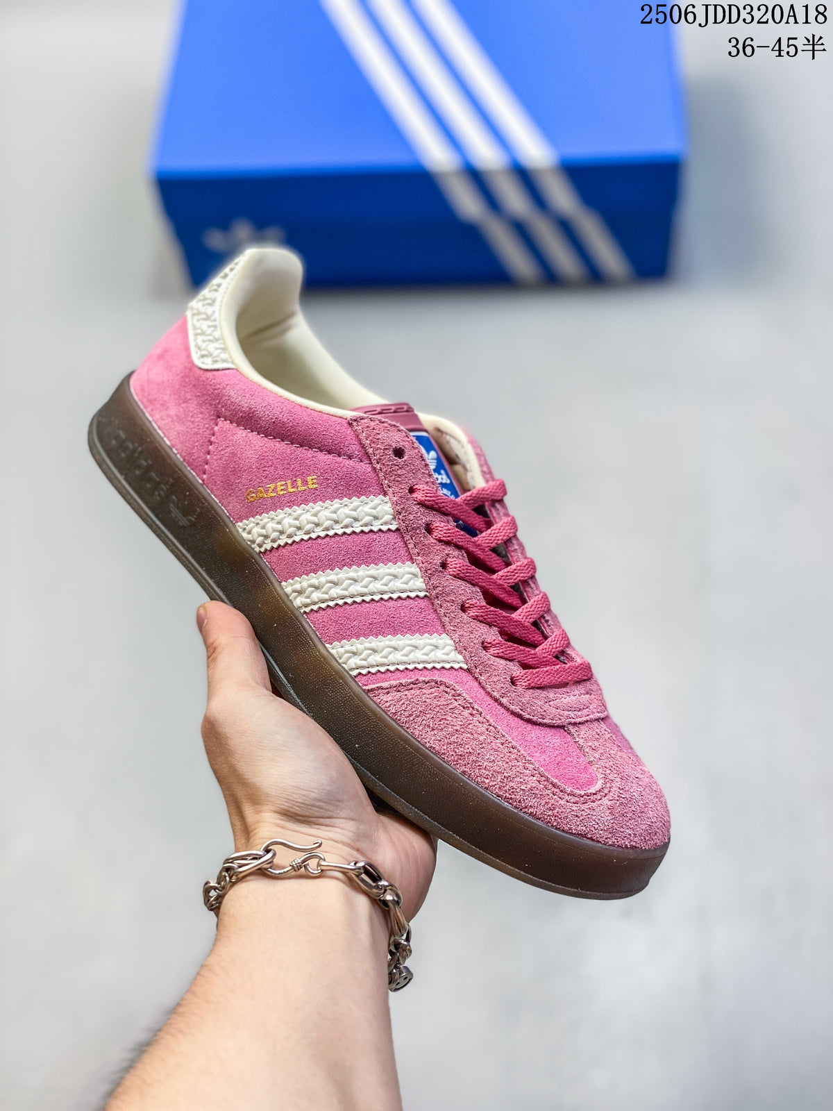 Pink Adidas Gazelle 90 sneaker with cream textured stripes and a dark sole