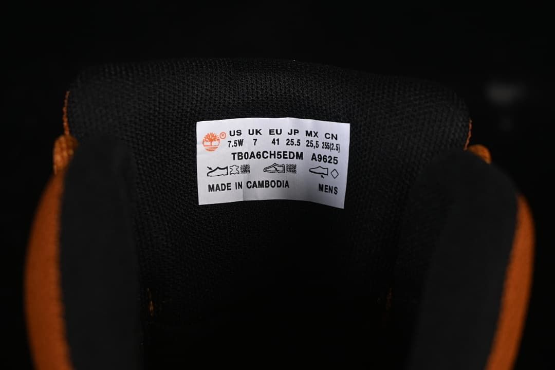 Tongue label showing model code TB0A6CH5EDM and EU size 41