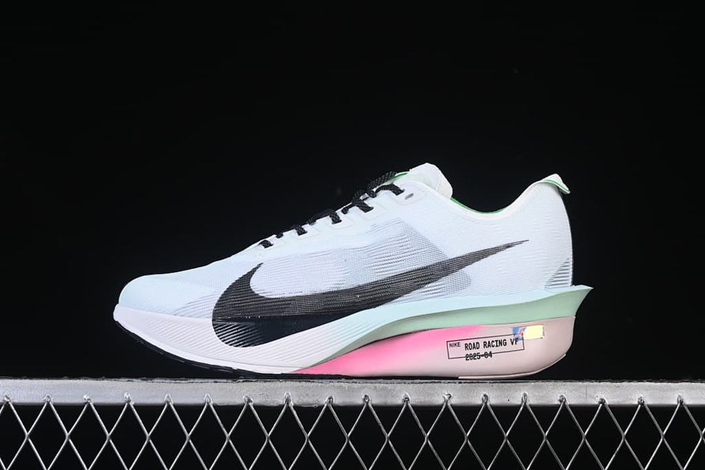Side view of white Nike ZoomX Vaporfly NEXT% 4 road-racing shoe with black Swoosh and mint and pink accents