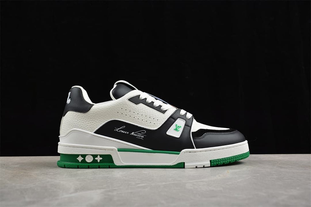 Side profile highlighting the sneaker's perforated panels and green outsole accents.