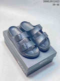 Dark gray ECCO sandals with two buckle straps, shown on a branded box; image also displays style code 2606LD512A22 and sizes 39–46.