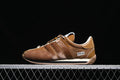 Side profile of a brown adidas Country OG SFTM sneaker
