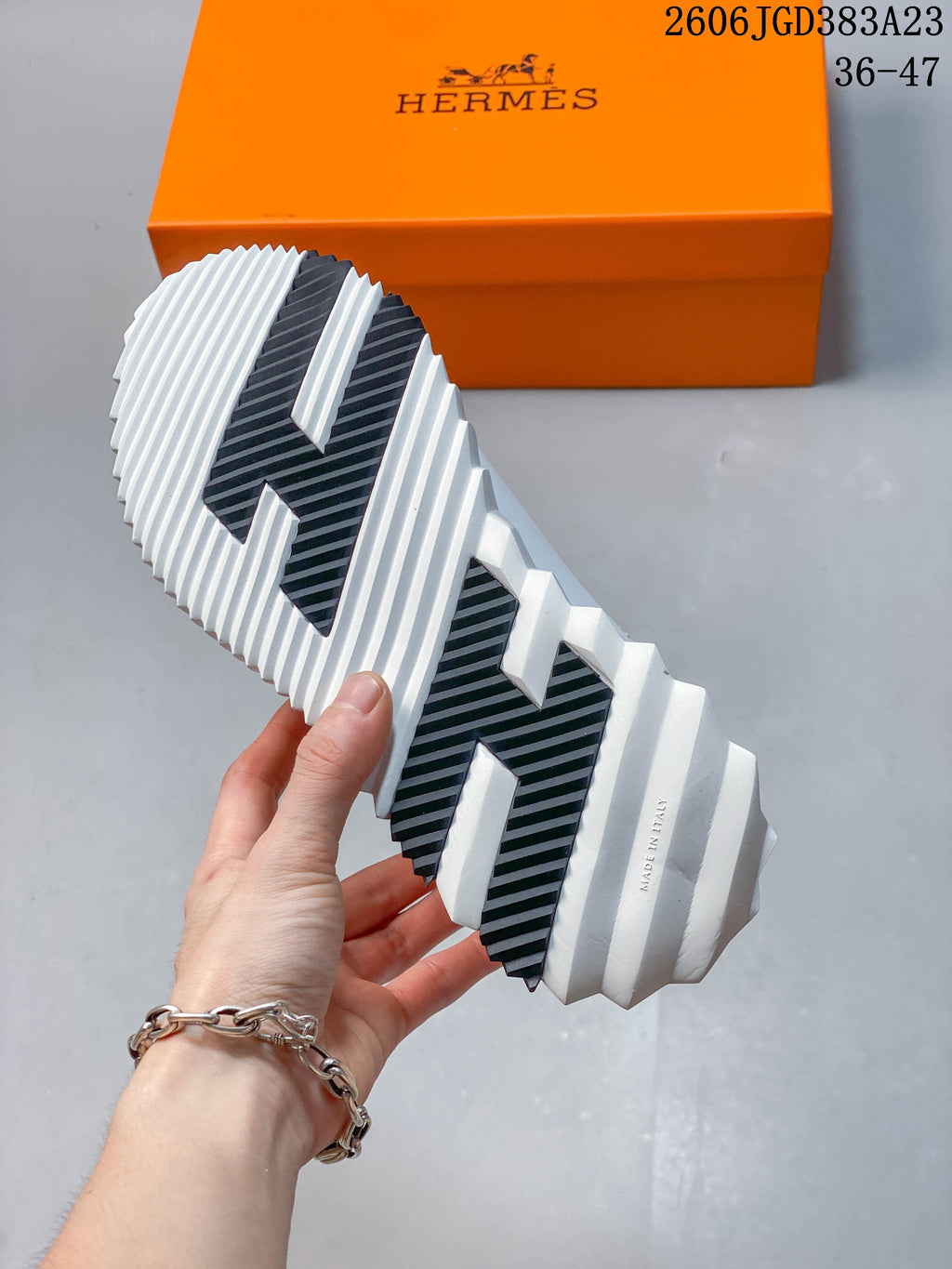 Close-up of the sneaker's ridged white outsole with black sections