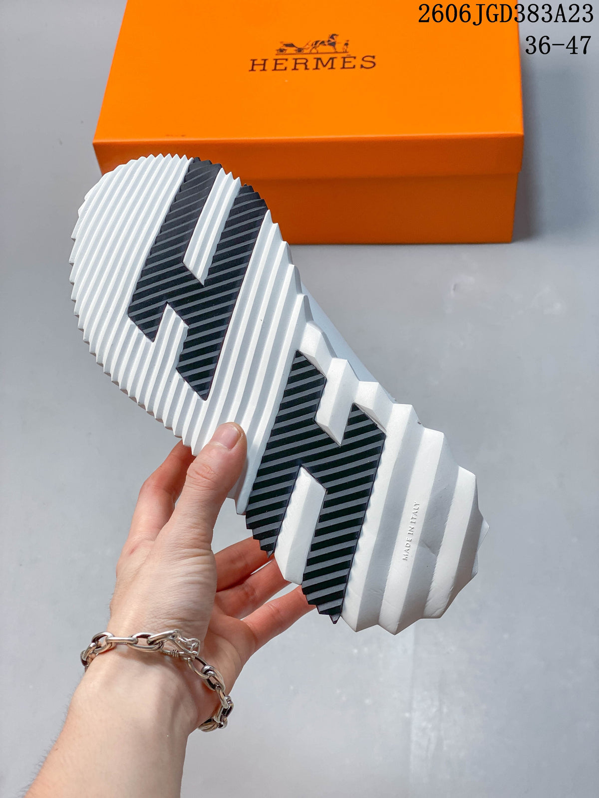 Close-up of the sneaker's ridged white outsole with black sections